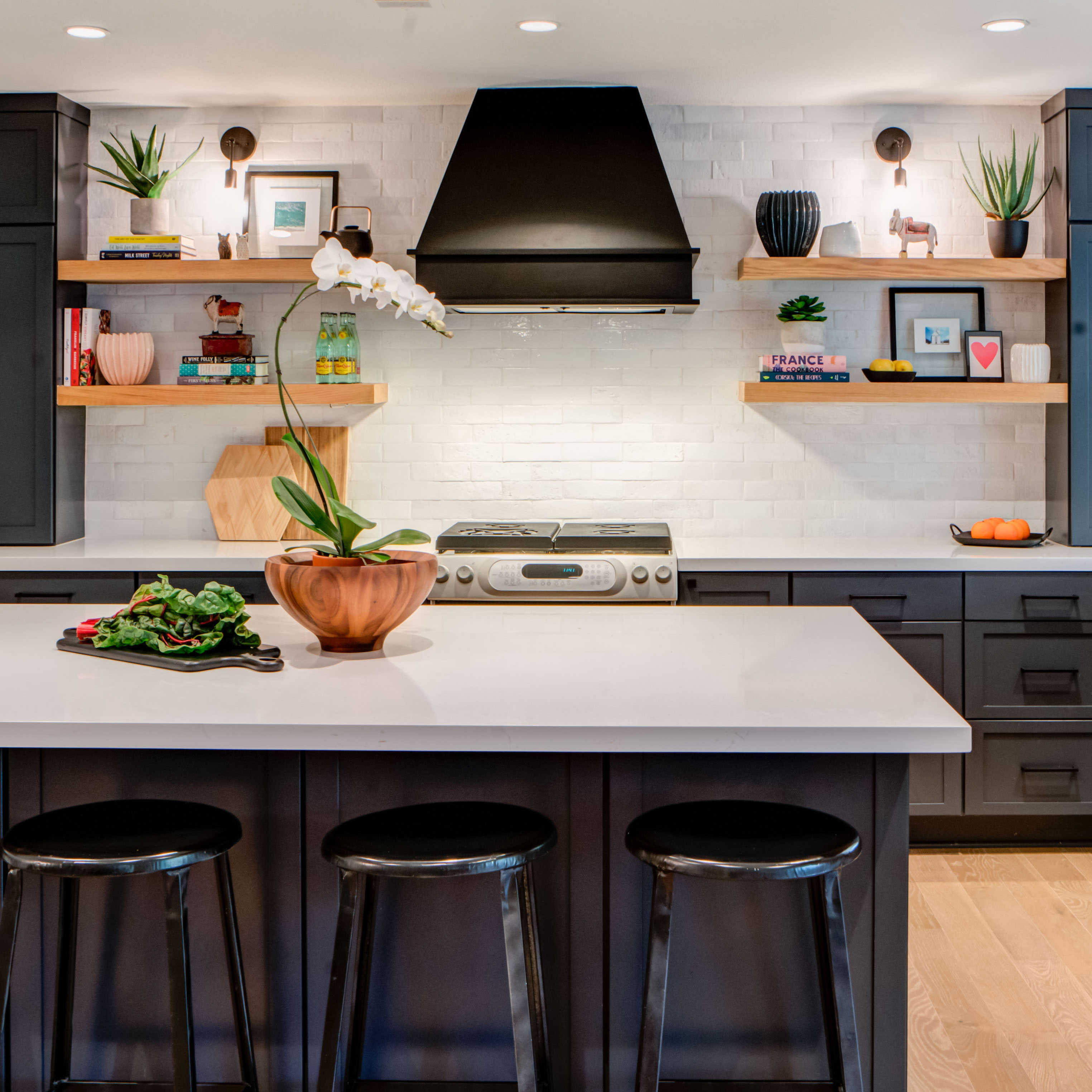 Downtown Minimalist Adjustable Wall Sconce | Photo Courtesy of Homeowner & Jonathan Garza Photography